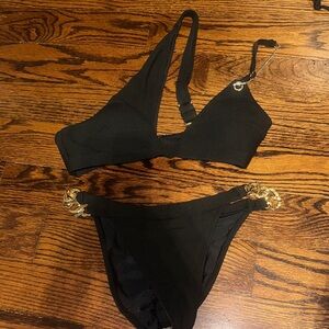 New without tags never worn Black Bikini with Gold Accents